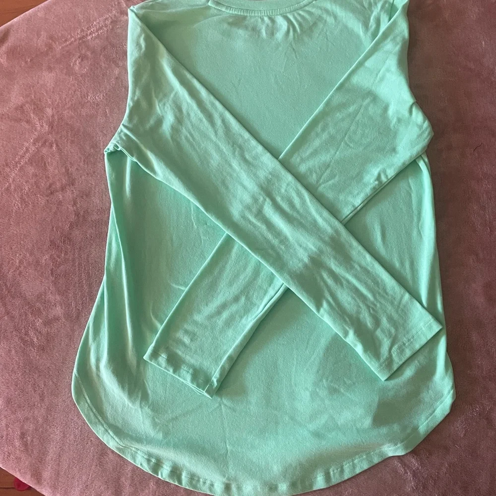 Under Armour long sleeve top. - Picture 6 of 9